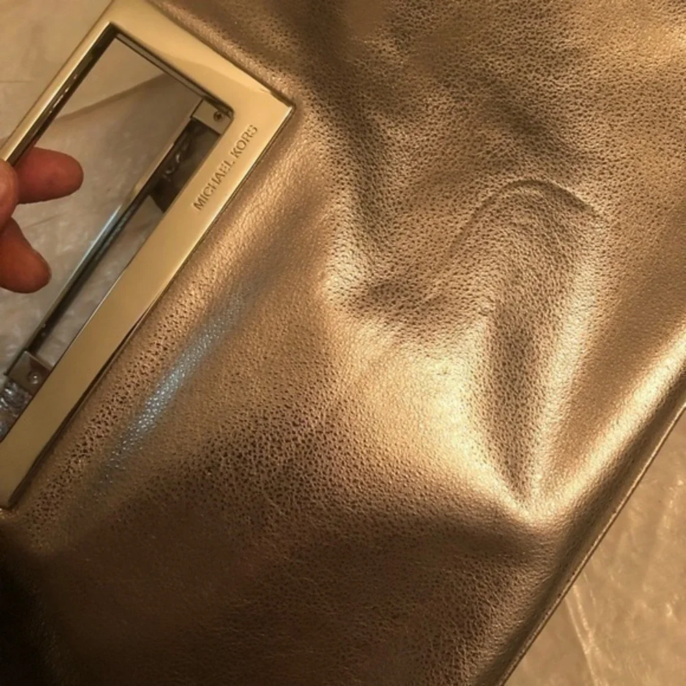 Michael kors silver leather convertible clutch bag